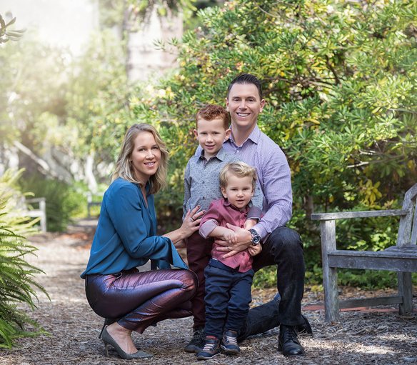 Family with two boys in a garden